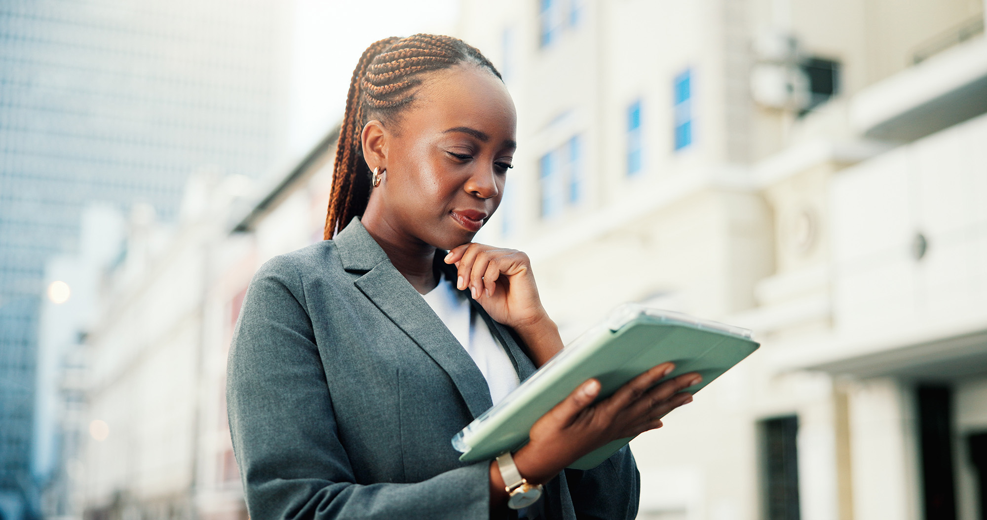 Real estate professional using digital property management systems