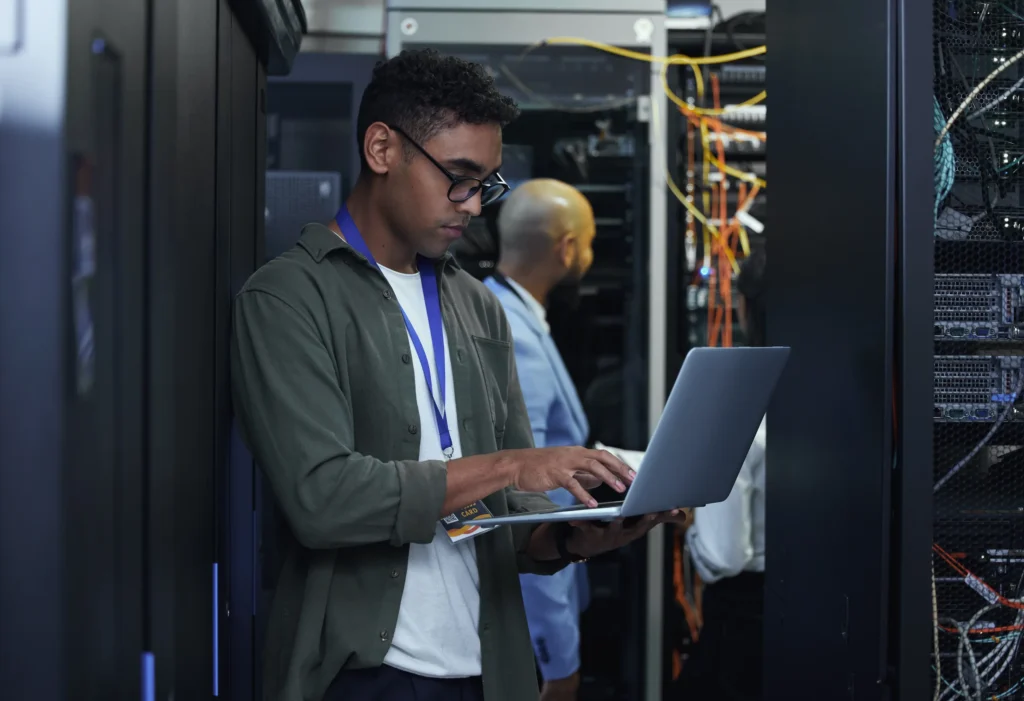 A Reflective IT engineer setting up a device